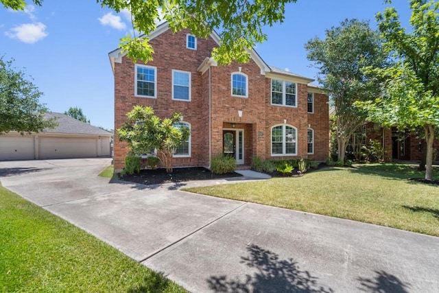 13617 Sun Dapple Ct, Manor, TX 78653 - view of front of house with brick siding and a front lawn