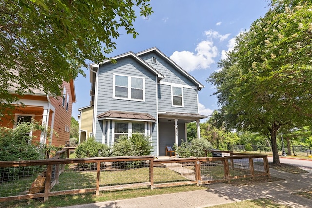 1601 Miriam Ave Unit 210, Austin, TX 78702 - view of front of house with a fenced front yard and a porch