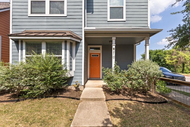1601 Miriam Ave Unit 210, Austin, TX 78702 - entrance to property with a standing seam roof and a porch