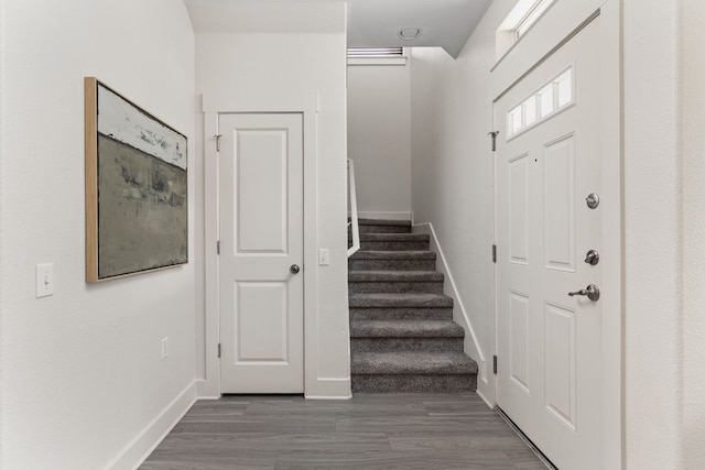 1601 Miriam Ave Unit 210, Austin, TX 78702 - staircase with baseboards and wood finished floors
