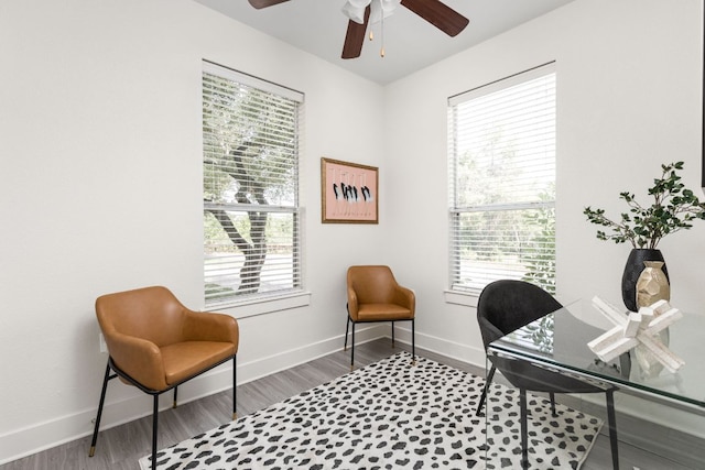 1601 Miriam Ave Unit 210, Austin, TX 78702 - home office featuring ceiling fan, wood finished floors, and baseboards