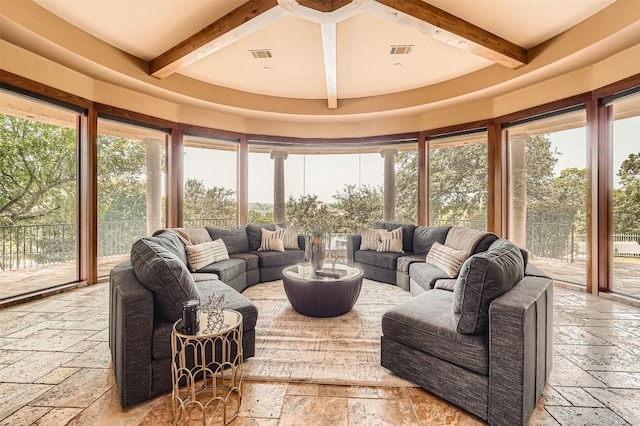 312 Camino Arbolago, Lakeway, TX 78734 - sunroom featuring stone tile flooring and beam ceiling