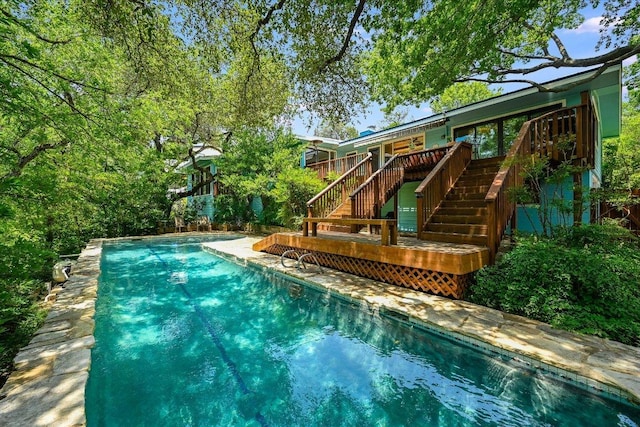 3403 Spanish Oak Dr, Austin, TX 78731 - outdoor pool featuring stairs and a deck