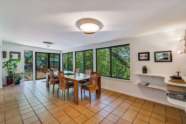 3403 Spanish Oak Dr, Austin, TX 78731 - dining space with light tile patterned floors and baseboards