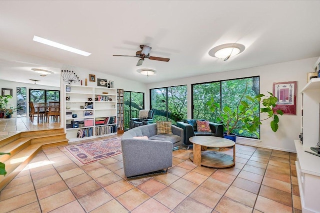 3403 Spanish Oak Dr, Austin, TX 78731 - living room featuring light tile patterned floors, a ceiling fan, and lofted ceiling