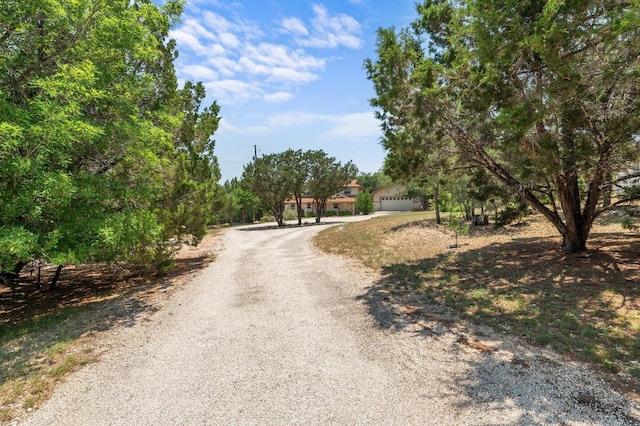 14101 Washoe Cir, Austin, TX 78734 - view of dirt / gravel driveway