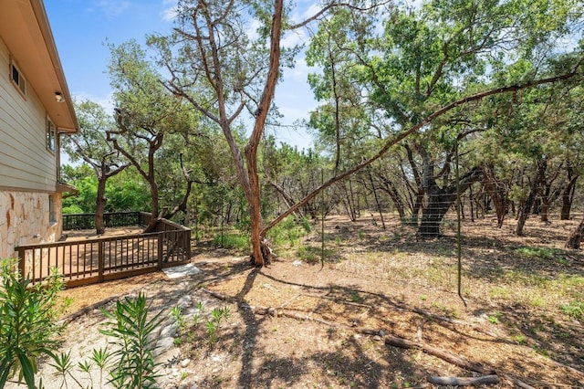 14101 Washoe Cir, Austin, TX 78734 - view of yard featuring a deck