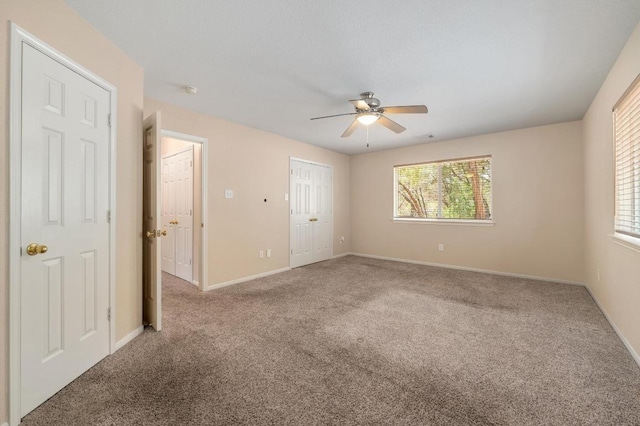 14101 Washoe Cir, Austin, TX 78734 - unfurnished bedroom with carpet floors and multiple windows