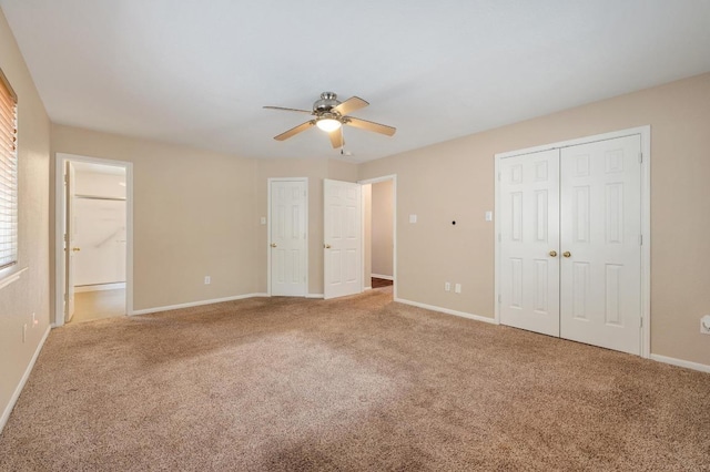 14101 Washoe Cir, Austin, TX 78734 - unfurnished bedroom featuring baseboards, carpet floors, a ceiling fan, connected bathroom, and a closet
