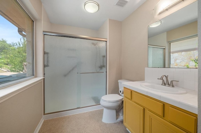 14101 Washoe Cir, Austin, TX 78734 - full bathroom with toilet, a stall shower, vanity, and tasteful backsplash