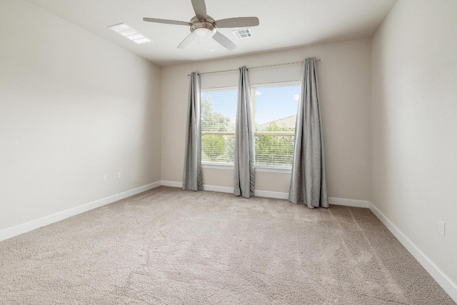 2613 Ibaza Bnd Unit 58, Leander, TX 78641 - carpeted spare room with a ceiling fan and baseboards