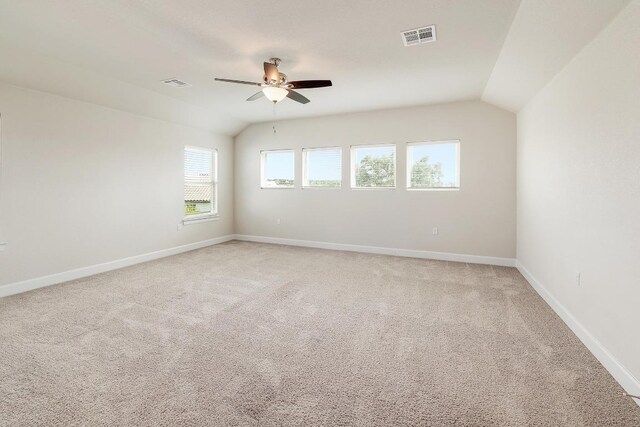 2613 Ibaza Bnd Unit 58, Leander, TX 78641 - unfurnished room with ceiling fan, lofted ceiling, baseboards, and light colored carpet
