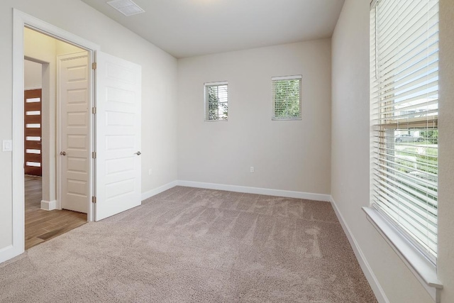 2613 Ibaza Bnd Unit 58, Leander, TX 78641 - unfurnished room with carpet flooring and baseboards
