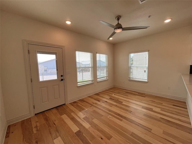 2105 Tiger Trl Unit 503, Round Rock, TX 78665 - foyer entrance featuring light wood-style floors, a ceiling fan, recessed lighting, and baseboards