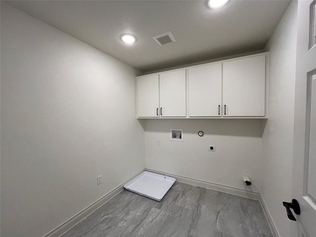 2105 Tiger Trl Unit 503, Round Rock, TX 78665 - laundry room featuring hookup for an electric dryer, baseboards, cabinet space, washer hookup, and recessed lighting