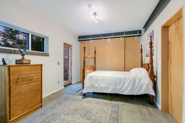 8207 Moon Rise Trl, Jonestown, TX 78645 - bedroom featuring baseboards and access to outside