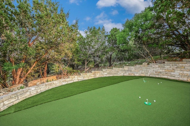 8207 Moon Rise Trl, Jonestown, TX 78645 - view of home's community with a putting area