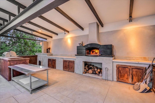 8207 Moon Rise Trl, Jonestown, TX 78645 - view of patio featuring a fireplace