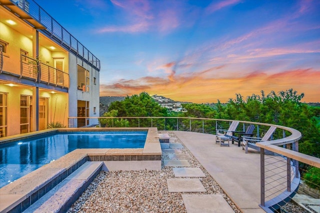 8207 Moon Rise Trl, Jonestown, TX 78645 - view of pool featuring a jacuzzi and a patio