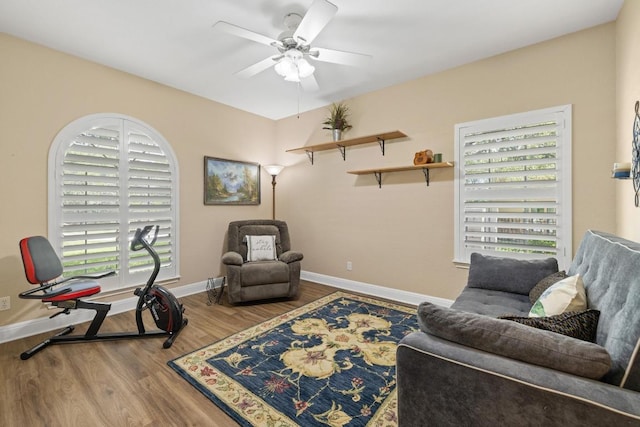 606 Explorer, Lakeway, TX 78734 - sitting room featuring a ceiling fan, healthy amount of natural light, wood finished floors, and baseboards