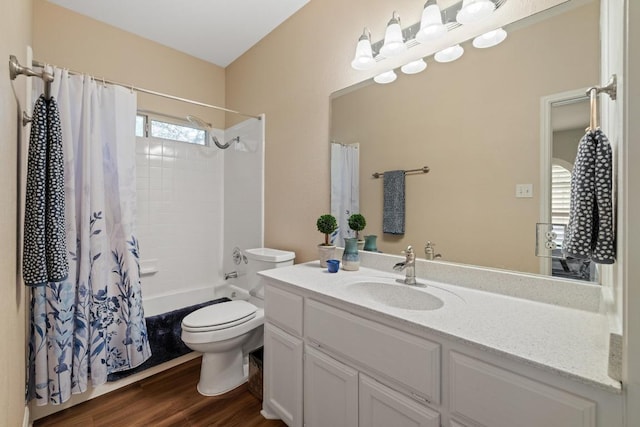 606 Explorer, Lakeway, TX 78734 - full bath with vanity, shower / bath combo with shower curtain, and wood finished floors