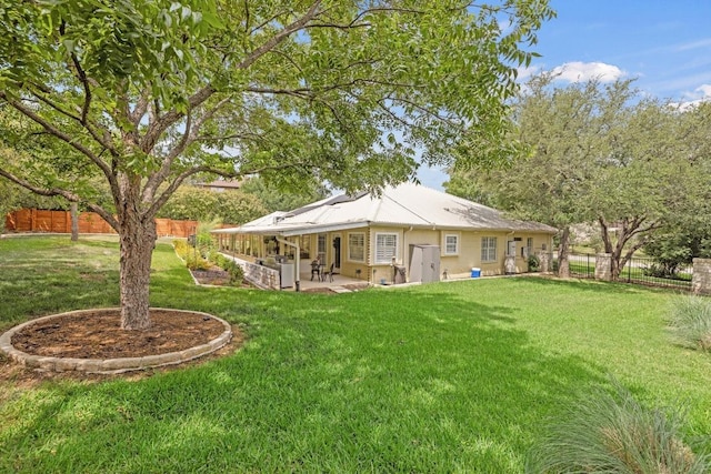606 Explorer, Lakeway, TX 78734 - back of property with a fenced backyard and a patio