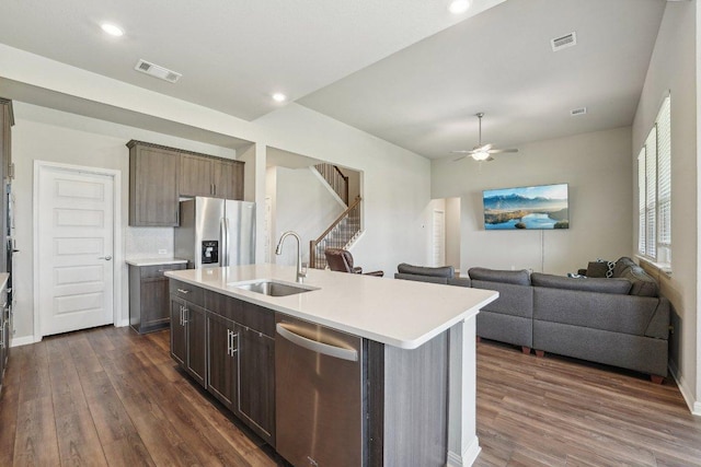 357 Cathedral Mountain Dr, Dripping Springs, TX 78620 - kitchen featuring stainless steel appliances, a sink, dark wood-style floors, open floor plan, and recessed lighting