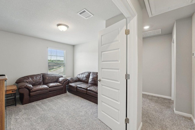 357 Cathedral Mountain Dr, Dripping Springs, TX 78620 - carpeted living room featuring baseboards