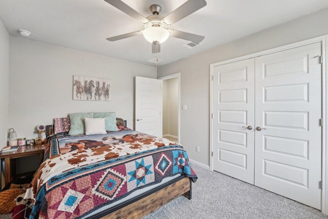 357 Cathedral Mountain Dr, Dripping Springs, TX 78620 - carpeted bedroom featuring a closet, baseboards, and ceiling fan
