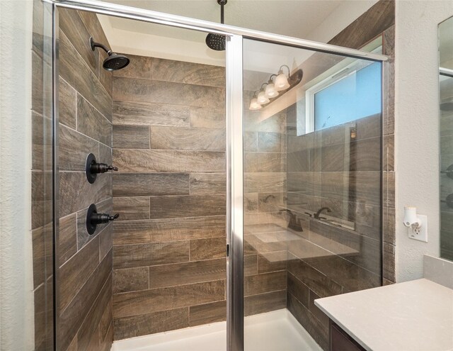 7632 Lombardy Loop, Round Rock, TX 78665 - bathroom featuring a shower stall and vanity