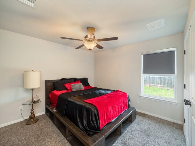 7632 Lombardy Loop, Round Rock, TX 78665 - bedroom featuring carpet, baseboards, and a ceiling fan