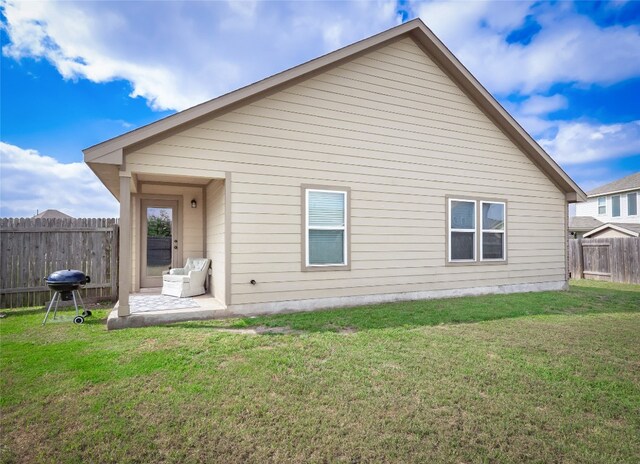 7632 Lombardy Loop, Round Rock, TX 78665 - rear view of property featuring a patio
