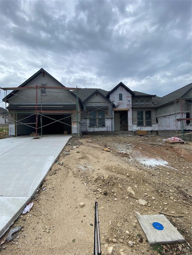 309 Yaklin Dr, Liberty Hill, TX 78642 - unfinished property with concrete driveway