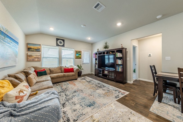 221 Tributary Way, Bastrop, TX 78602 - living room with dark wood-type flooring, vaulted ceiling, and recessed lighting