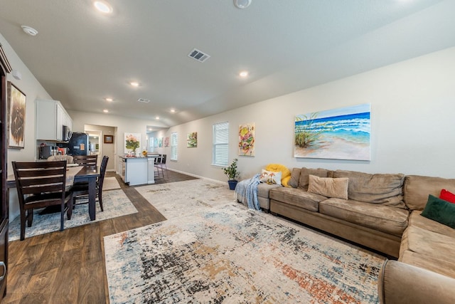221 Tributary Way, Bastrop, TX 78602 - living area featuring dark wood-style flooring and recessed lighting