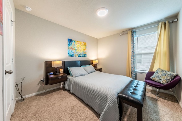 221 Tributary Way, Bastrop, TX 78602 - bedroom featuring light carpet and baseboards