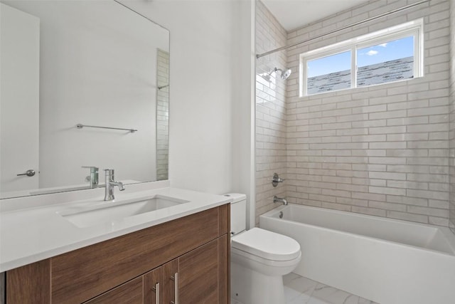 900 S 2nd St Unit 21, Austin, TX 78704 - full bathroom with marble look tile flooring, toilet, vanity, and washtub / shower combination