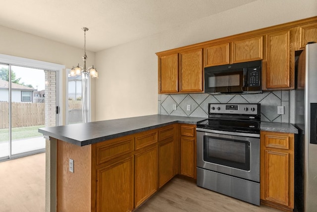 118 Lone Shadow Dr, Harker Heights, TX 76548 - kitchen with appliances with stainless steel finishes, light wood-style floors, a peninsula, brown cabinetry, and tasteful backsplash