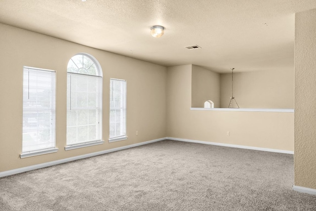118 Lone Shadow Dr, Harker Heights, TX 76548 - unfurnished room featuring carpet flooring, a textured ceiling, and baseboards