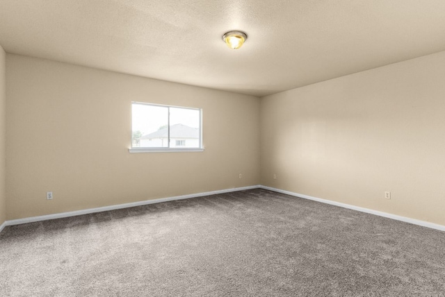 118 Lone Shadow Dr, Harker Heights, TX 76548 - unfurnished room featuring carpet flooring, baseboards, and a textured ceiling