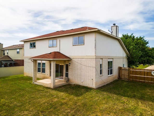 118 Lone Shadow Dr, Harker Heights, TX 76548 - rear view of house with a patio area, a chimney, and brick siding