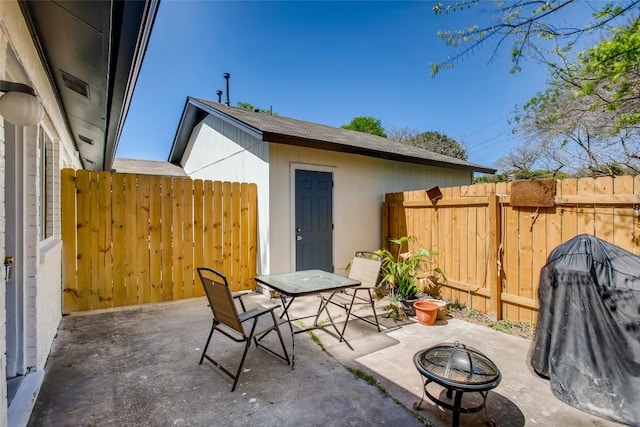 312 W William Cannon Dr, Austin, TX 78745 - view of patio / terrace featuring a fire pit and outdoor dining area