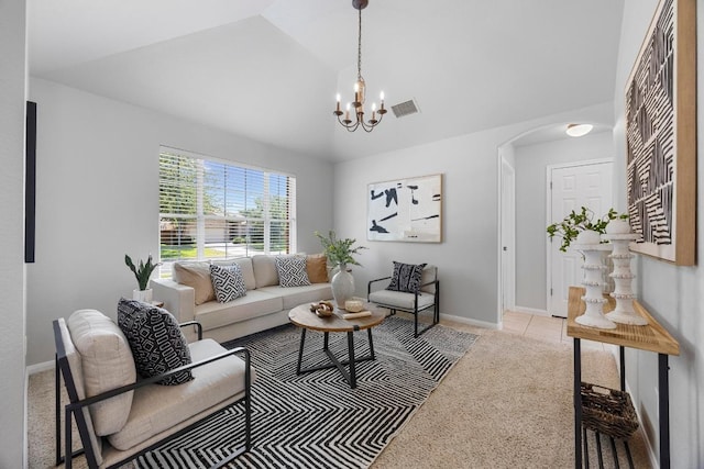 805 Meadow Bluff Ct, Round Rock, TX 78665 - carpeted living room featuring arched walkways, a chandelier, vaulted ceiling, and baseboards