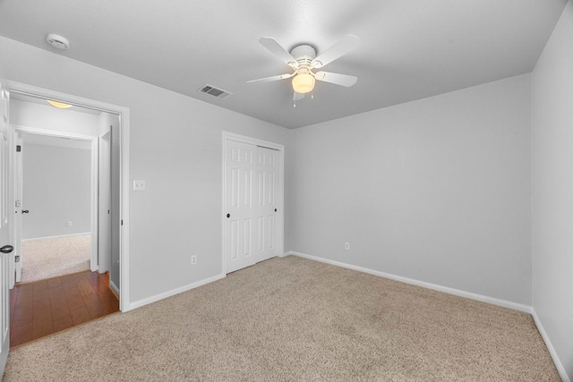 805 Meadow Bluff Ct, Round Rock, TX 78665 - unfurnished bedroom featuring carpet, baseboards, a closet, and ceiling fan