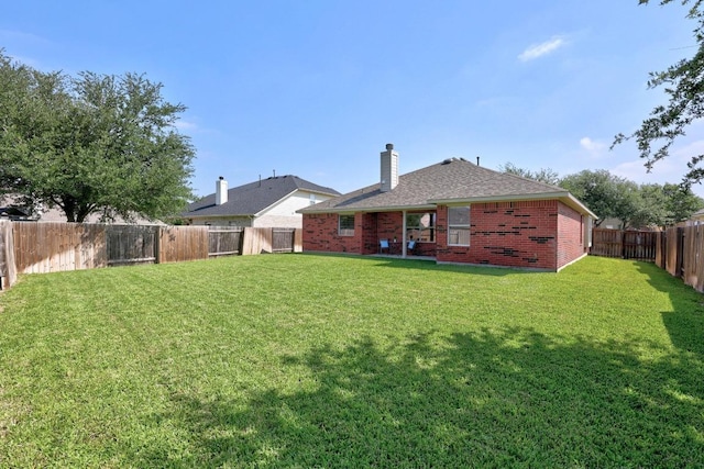 805 Meadow Bluff Ct, Round Rock, TX 78665 - rear view of property with brick siding, a chimney, and a shingled roof