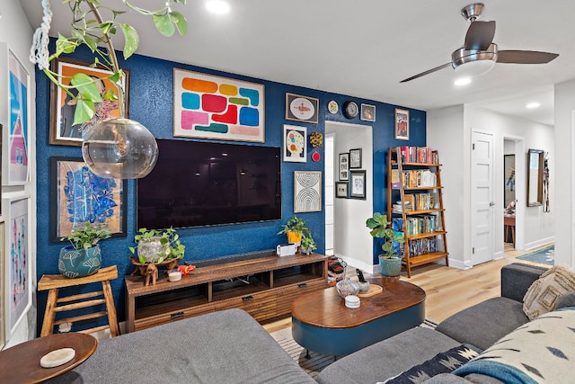 4708 Turnstone Dr, Austin, TX 78744 - living area featuring wood finished floors, baseboards, ceiling fan, and recessed lighting