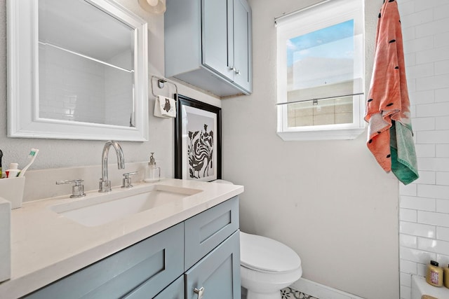 4708 Turnstone Dr, Austin, TX 78744 - bathroom with toilet, vanity, and a shower