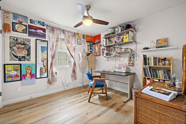 4708 Turnstone Dr, Austin, TX 78744 - home office with wood finished floors, ceiling fan, and baseboards