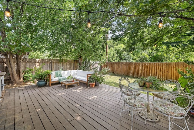 4708 Turnstone Dr, Austin, TX 78744 - wooden terrace featuring a fenced backyard and an outdoor hangout area