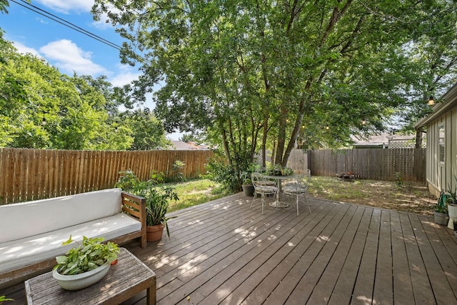 4708 Turnstone Dr, Austin, TX 78744 - deck featuring a fenced backyard and outdoor dining space